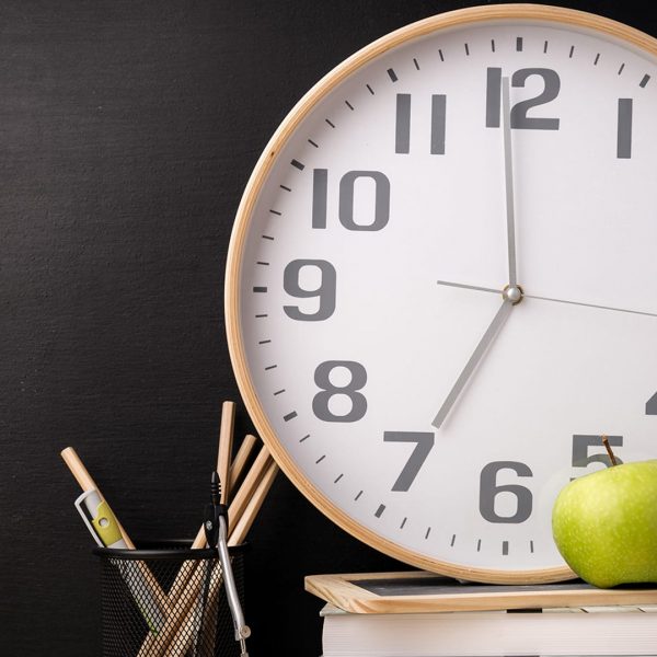 Composed stacked books with clock and fresh apple in arrangement with school stationery. ; Shutterstock ID 768035833; Purchase Order: TODAY.com; Segment/Job:  ; Client/Licensee:  ; Other: